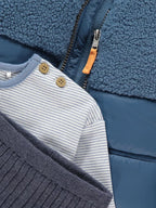 Blue Striped Sweatshirt Leggings and Gilet Outfit